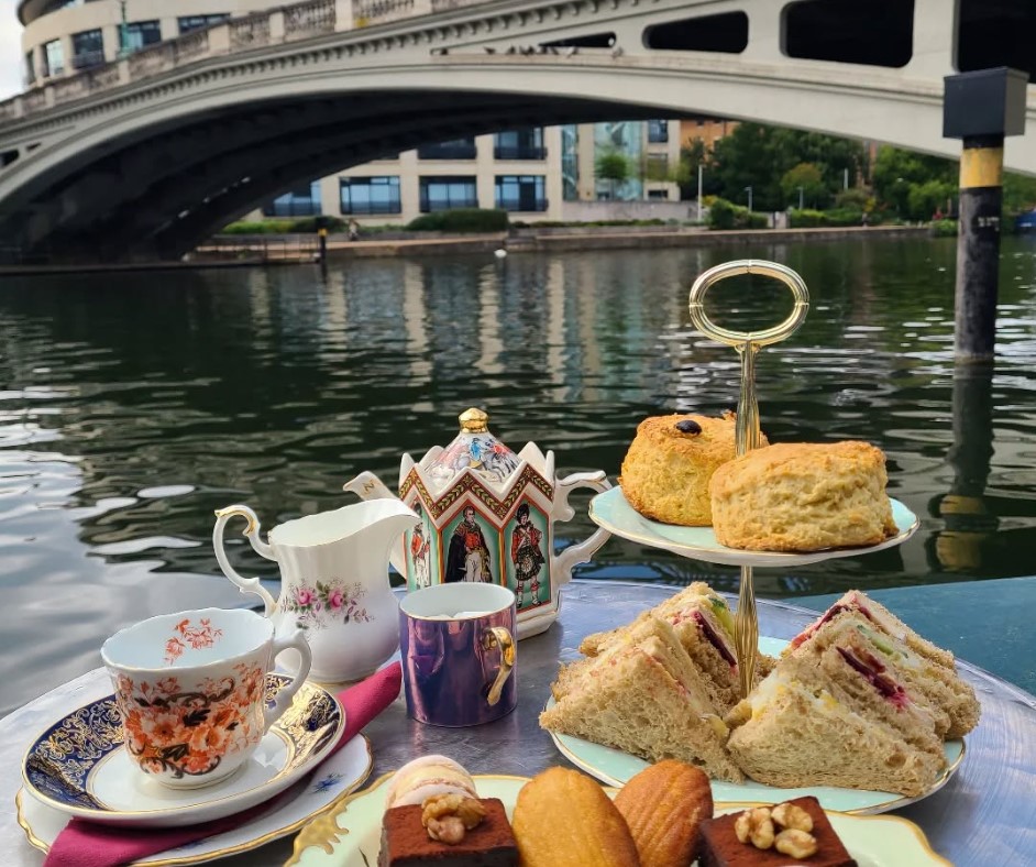 Afternoon tea on the river going under a bridge
